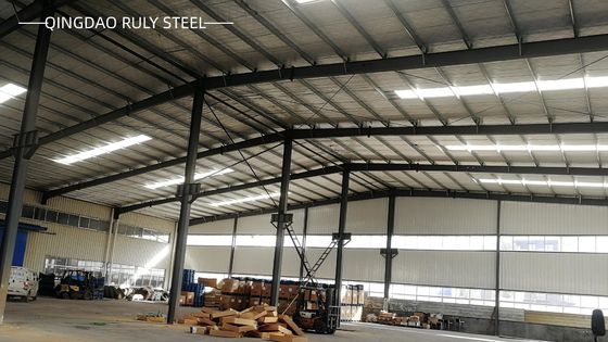 Struktur Baja Panjang yang Stabil Bagian H Bangunan Kerangka Baja Besar yang Dicat Lokakarya Prefab